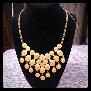 Peach and gold accent necklace